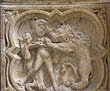 Panel 16:03 - Man dressed only in a lion-skin, driving his spear right through another lion